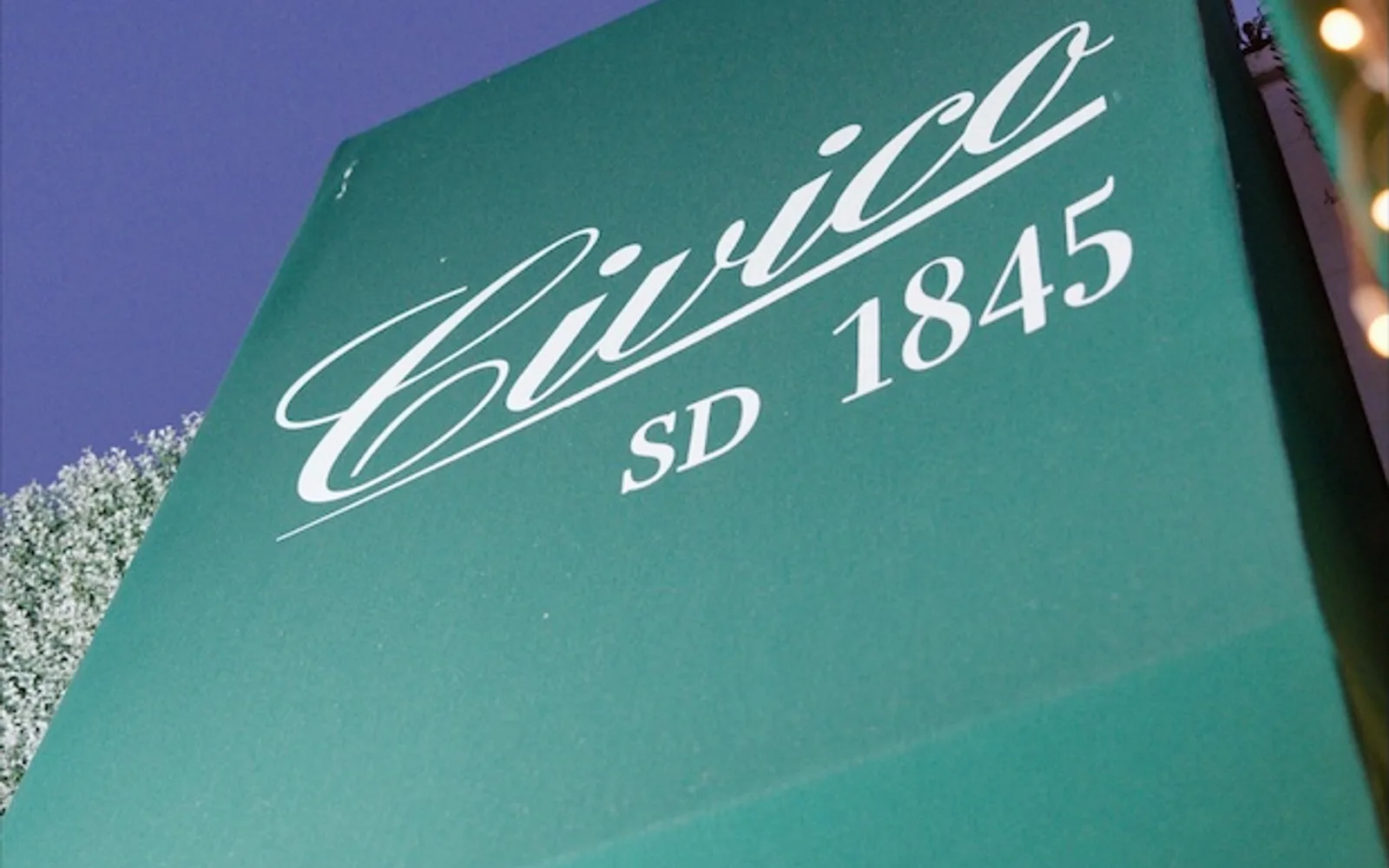 Civico 1845 logo on the restaurant's green entrance awning